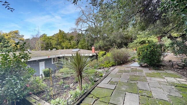 Building Photo - Light-Filled Home with Beautiful Garden & 2-Car Garage