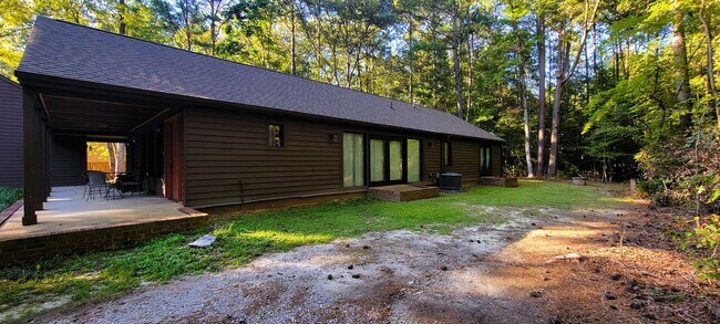 Building Photo - Remodeled secluded wooded oasis off of Qualla Road with handicap access