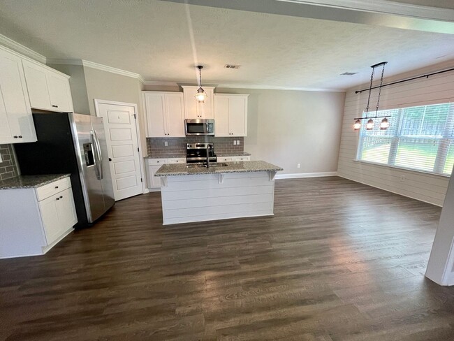 Building Photo - Whispering Pines 4 Bedroom 3.5 Bathroom Re...
