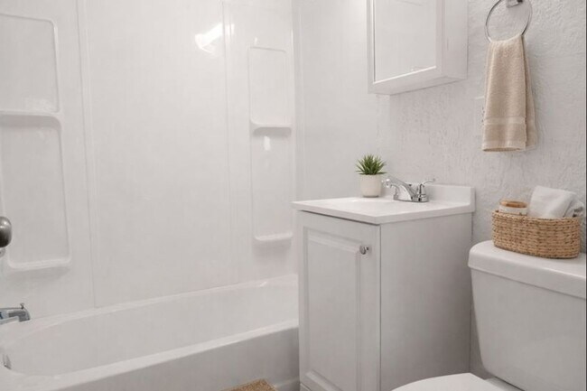 Building Photo - Secure this beautiful 3-bedroom townhome for a lower rent rate!!