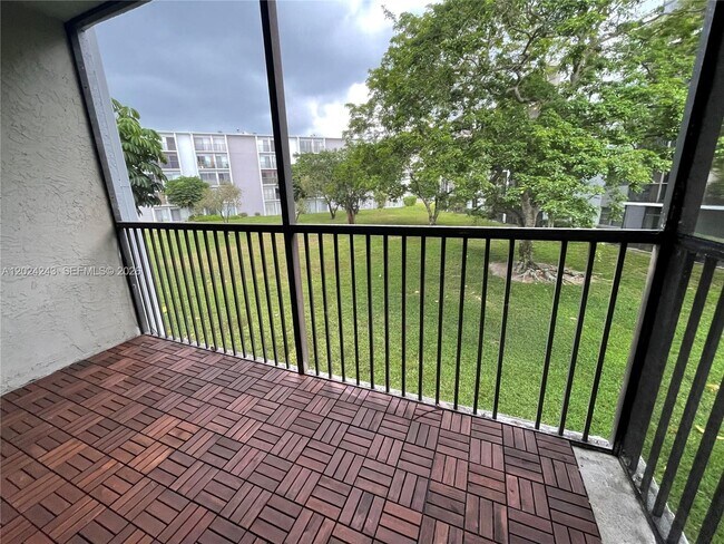 Building Photo - 8750 N Sherman Cir