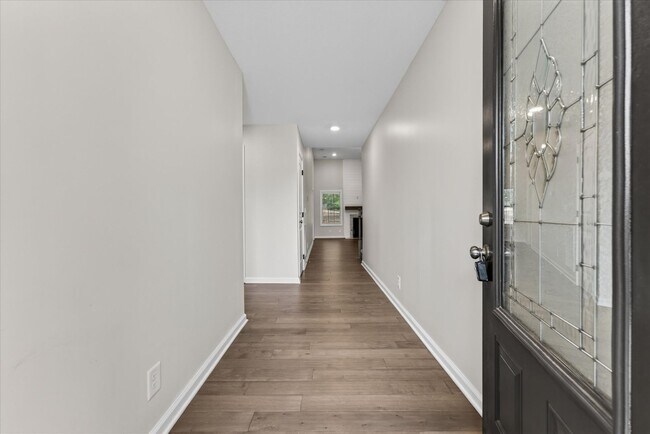 Building Photo - Like New Three Bedroom with Bonus!