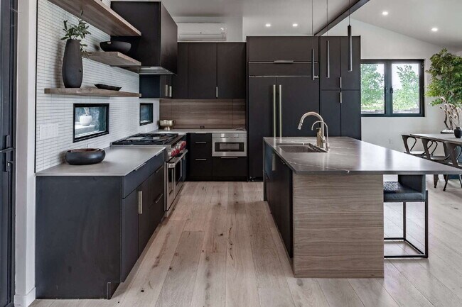 Building Photo - Modern Luxury Rental with Unobstructed Fla...