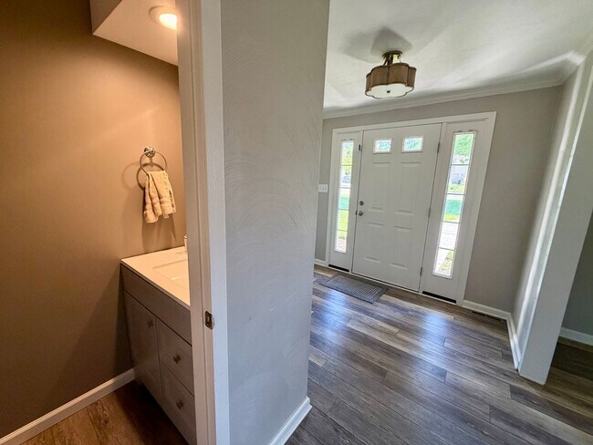 Building Photo - Modern Comforts Await: Spacious Rental with 2-Car Garage, Private Office, and Finished Basement w...