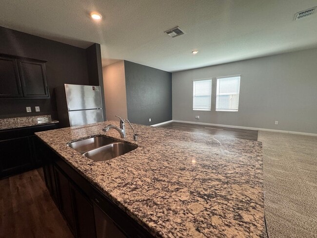 Building Photo - Spacious 4 Bedroom 3 Full Bath home in the Liberte Community!