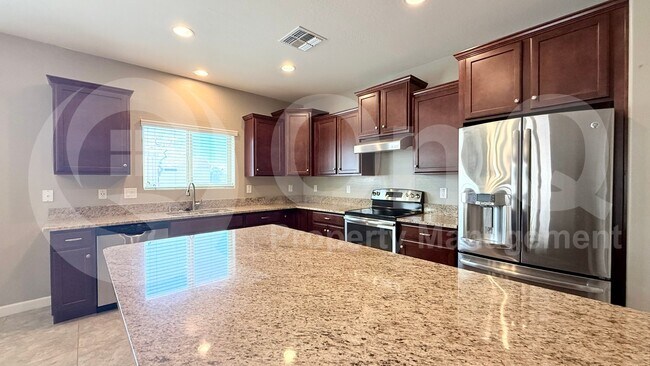 Building Photo - 1228 E Palo Verde Dr
