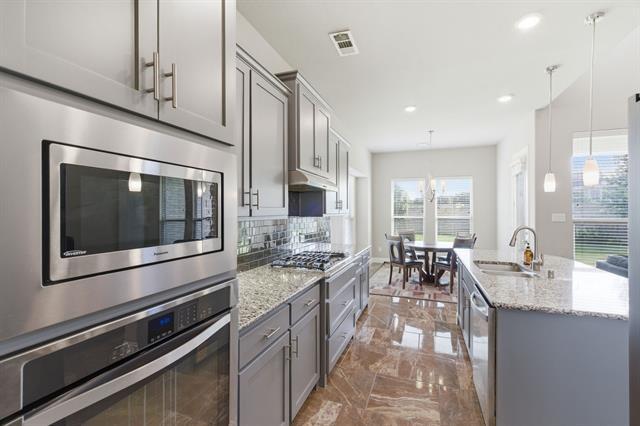 Building Photo - 7452 Reverchon Dr