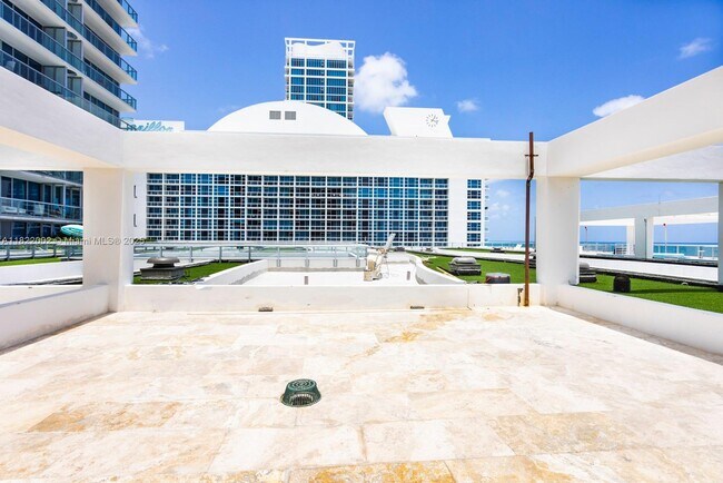 Building Photo - 6799 Collins Ave