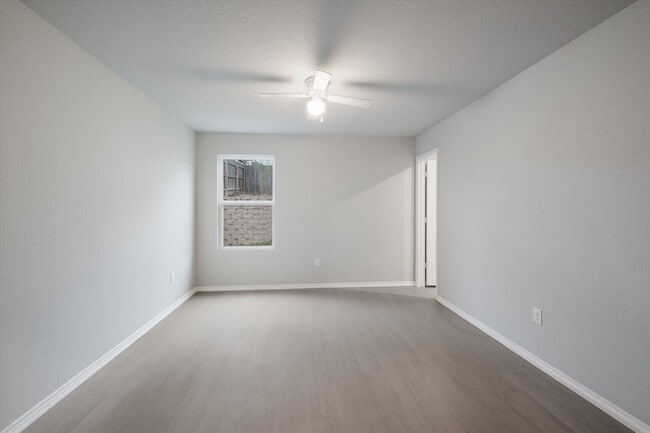 Building Photo - Open-Concept Living with New Flooring