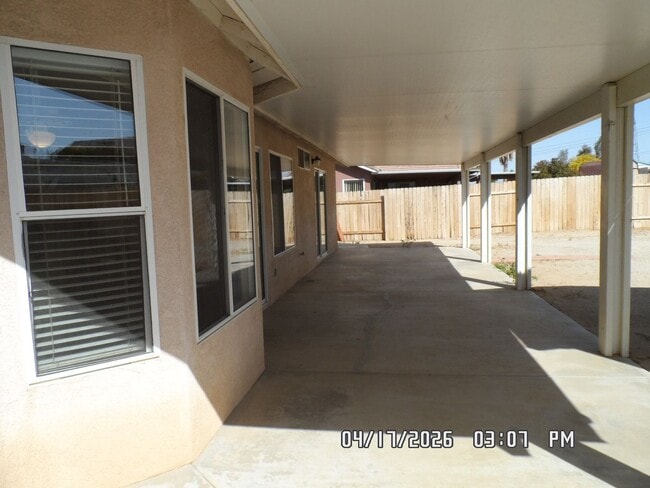 Building Photo - 3 Bedrooms, 2 Bathrooms, approx. 1392 sq. ft., 2 Car Garage, Covered Patio, Fenced, Play house,