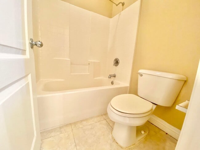Building Photo - THIS SPACIOUS RESIDENCE FEATURES 4 BEDROOM...