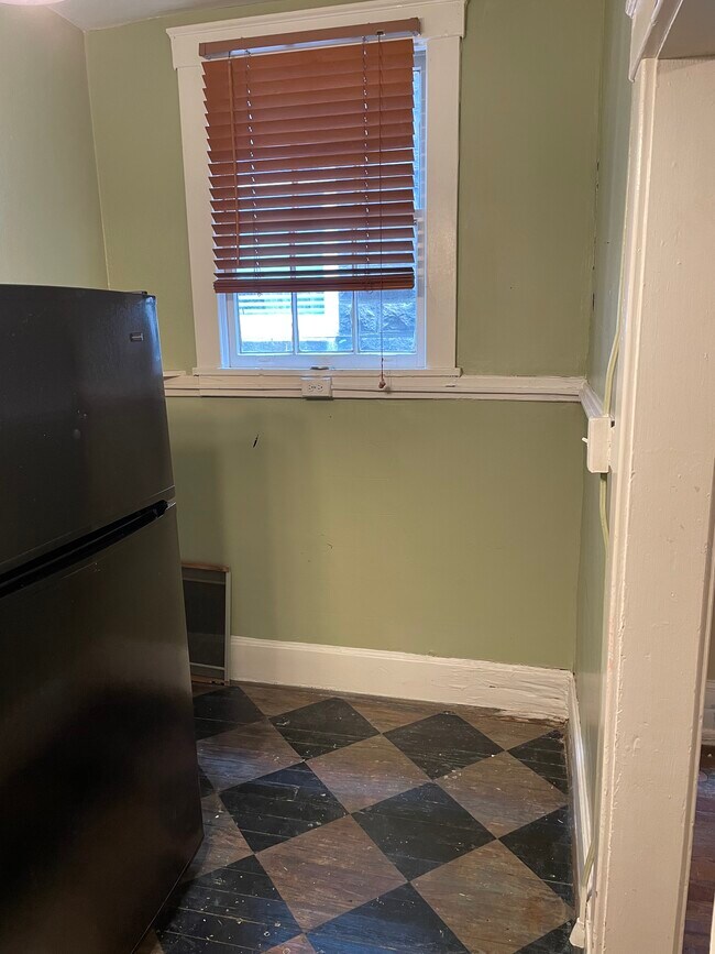 Kitchen angle 2 - 210 E State St