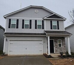 Building Photo - Stunning 4-bedroom, 2.5-bathroom home located in the vibrant city of Charlotte, NC.