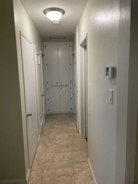 Hallway with storage - 5631 E Vernon St