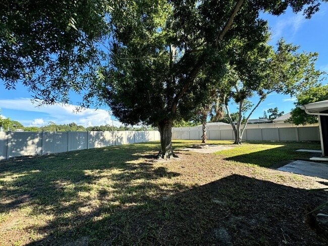 Building Photo - 2/2 with Fenced Yard, Garage and Laundry, Available Now!