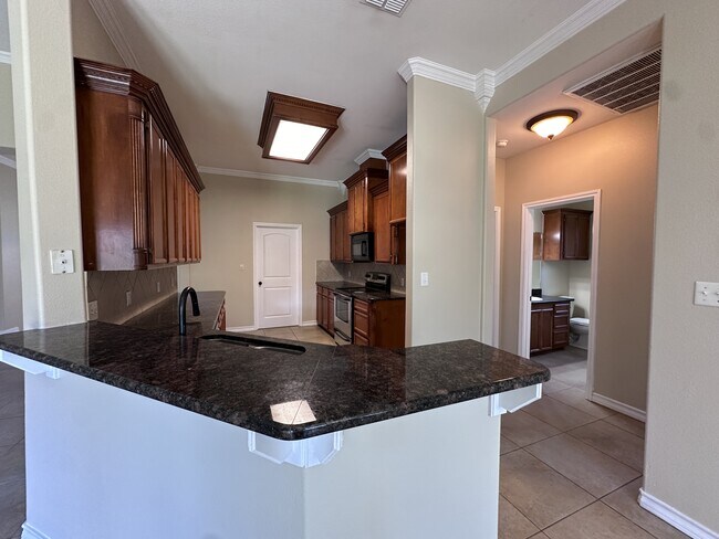 Building Photo - 5813 Aava Dr