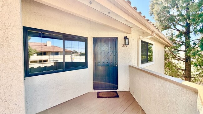 Building Photo - Beautifully Remodeled and Updated Upstairs Condo Unit in the Private & Gated Vista Way Village Co...
