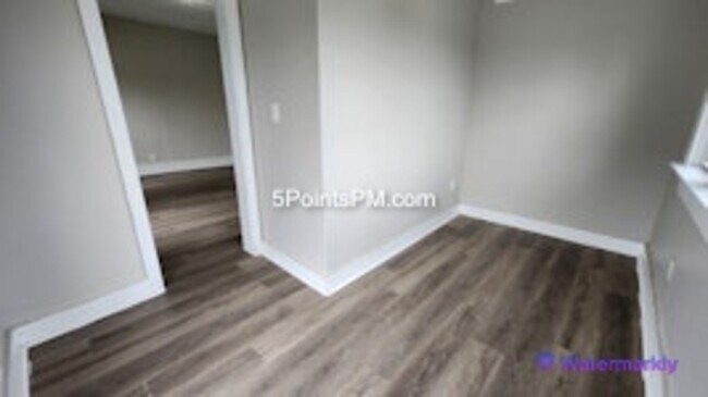 Building Photo - 9804 Miles Ave