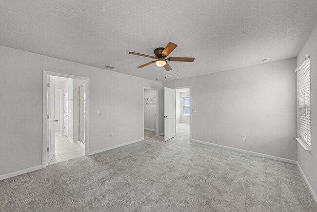 Building Photo - Brand-New 4BR Home with Tile Floors & Quartz Kitchen & Conservation Views
