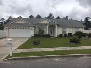 Building Photo - Spacious Home on a Beautiful Lot in a Quiet Neighborhood! *SPECIAL: 1/2 OFF 1st Month + Military ...