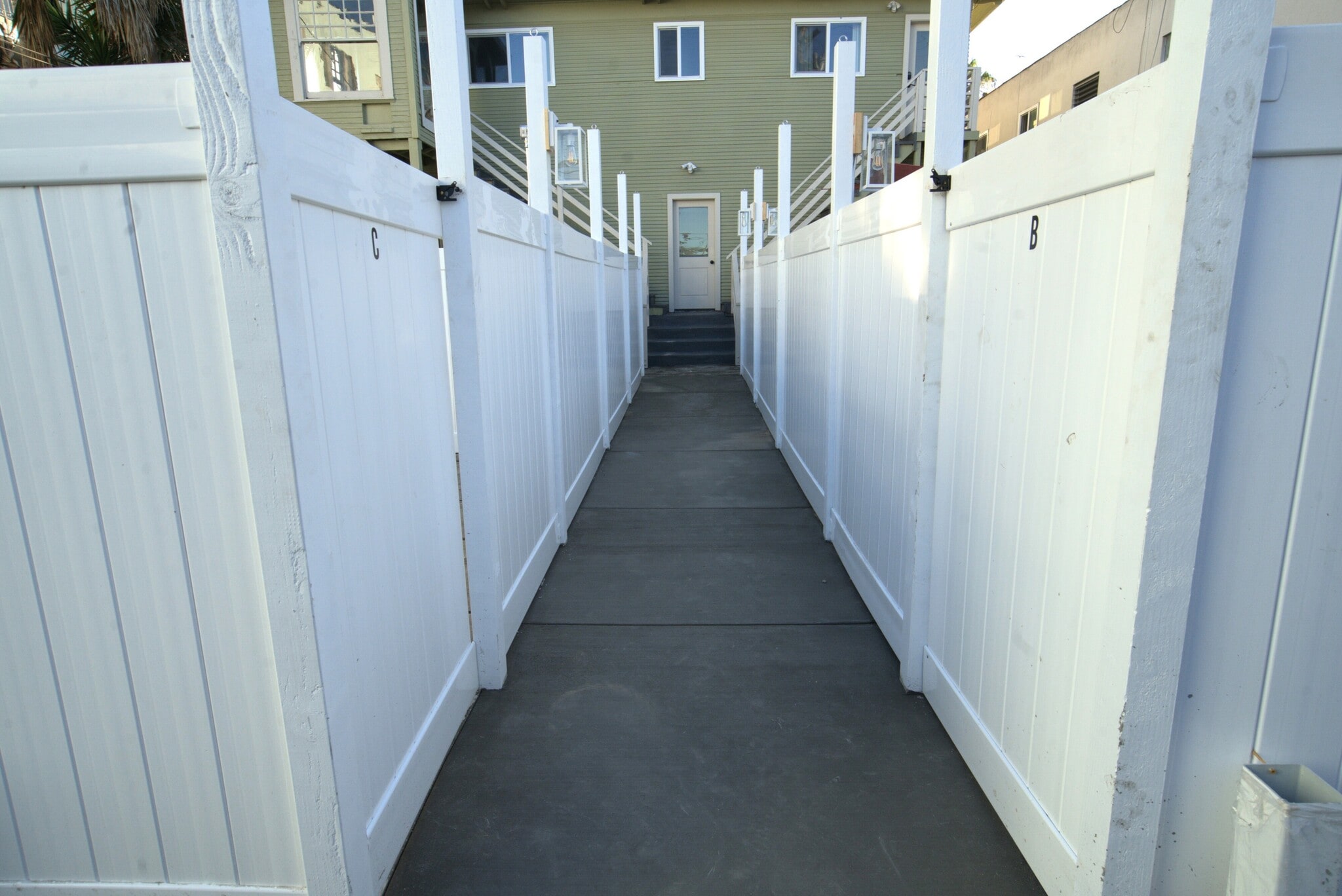 Walkway from garages to units - 1123 E Ocean Blvd