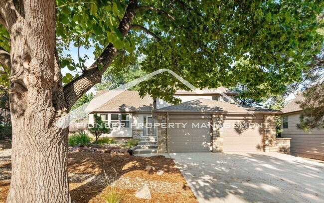 Building Photo - Beautifully Updated Rockrimmon Home Near Ute Valley Park with 5 bed, 3 bath, 2 car garage and AC!