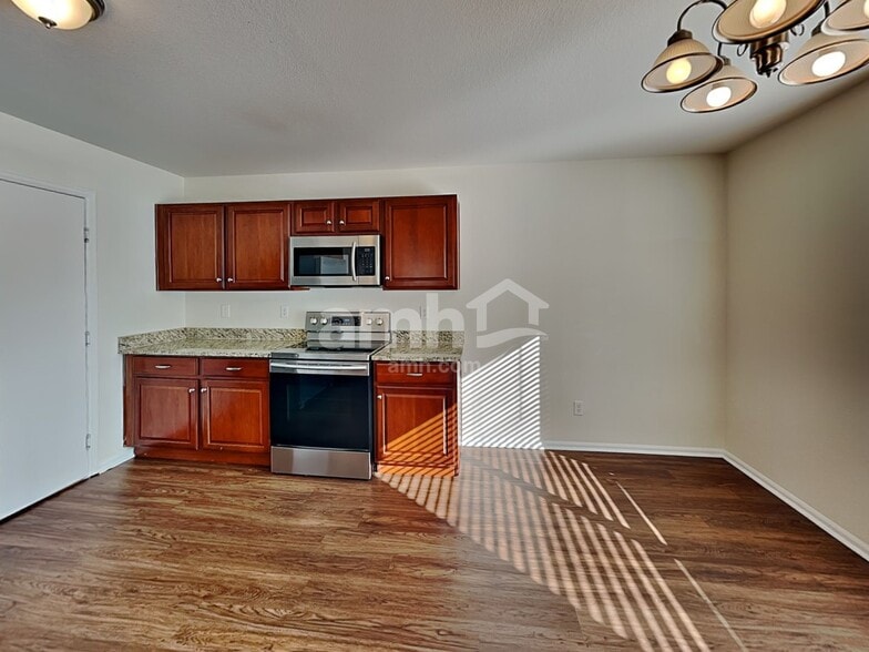 Building Photo - 5552 N Genoa St