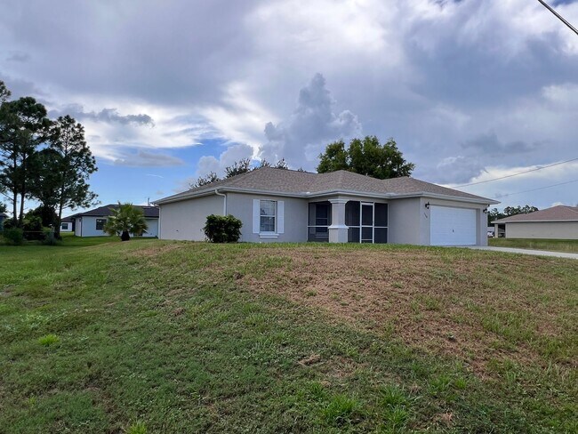 Building Photo - Charming 3-bedroom, 2-bath single-family home with a garage.