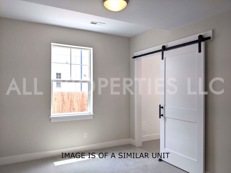 Building Photo - 8059 W 52nd Dr