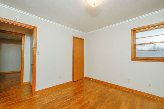 Building Photo - "Charming 3-Bedroom Greenfield Home with Gleaming Hardwood Floors – 1256 Sq Ft of Cozy Comfort!"