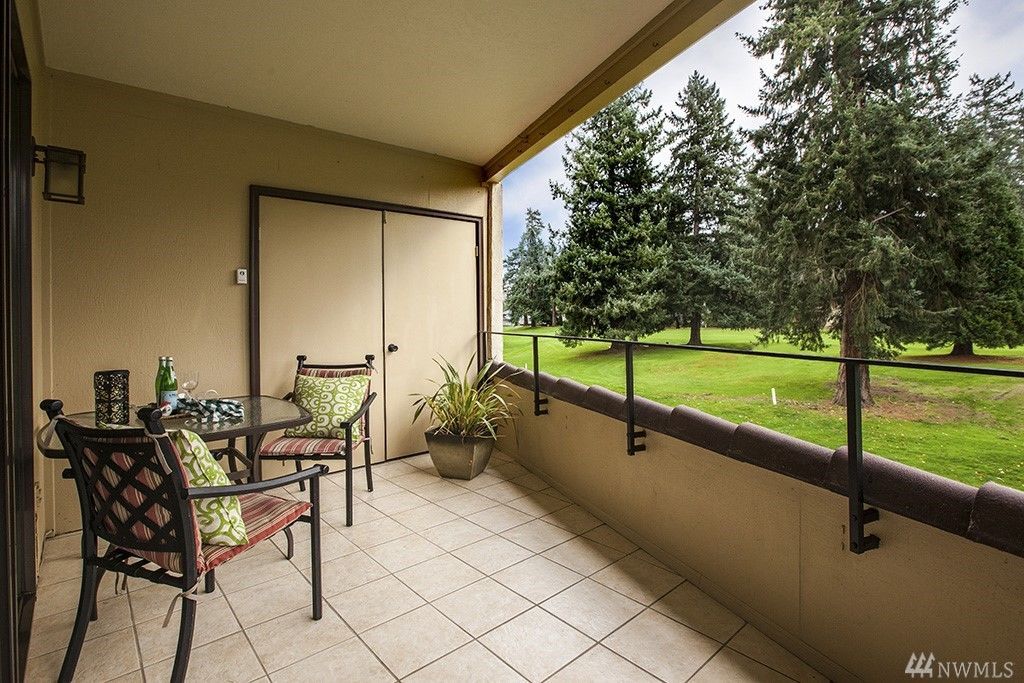 Covered deck outside the living room - 16929 Inglewood Rd NE