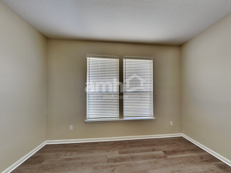 Building Photo - 7117 Rapid River Dr W