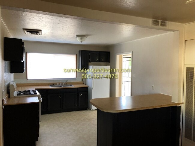Building Photo - 3 Bedroom, 2 Bath, 1 Car Garage with Fence...