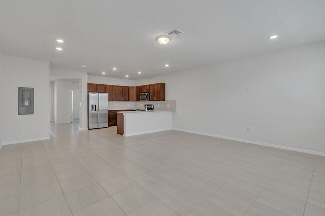 Building Photo - Luxurious Townhome in Lake Nona - A Perfec...
