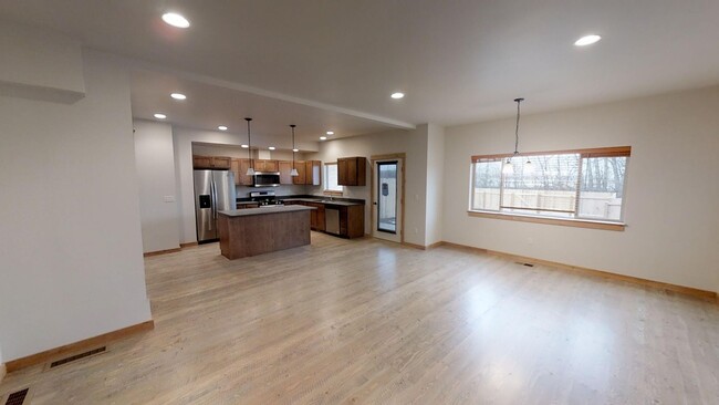 Building Photo - Spacious Townhome - Two Car Garage, Fenced...