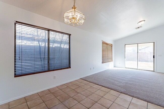 Building Photo - Three bedrooms! Fresh Carpet and Paint!