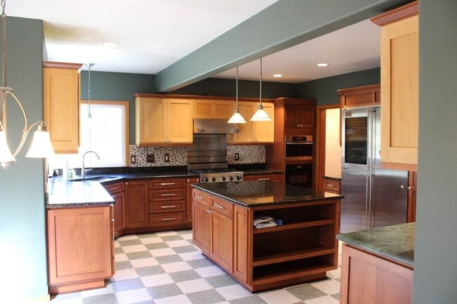 Building Photo - Experience Downtown Gig Harbor living in t...