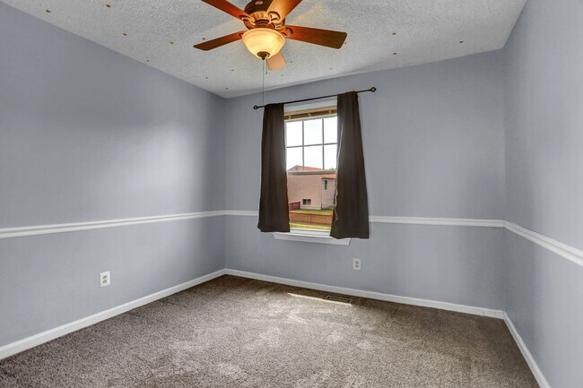 Building Photo - Spacious 4-Level Home with Deck, Workshop ...