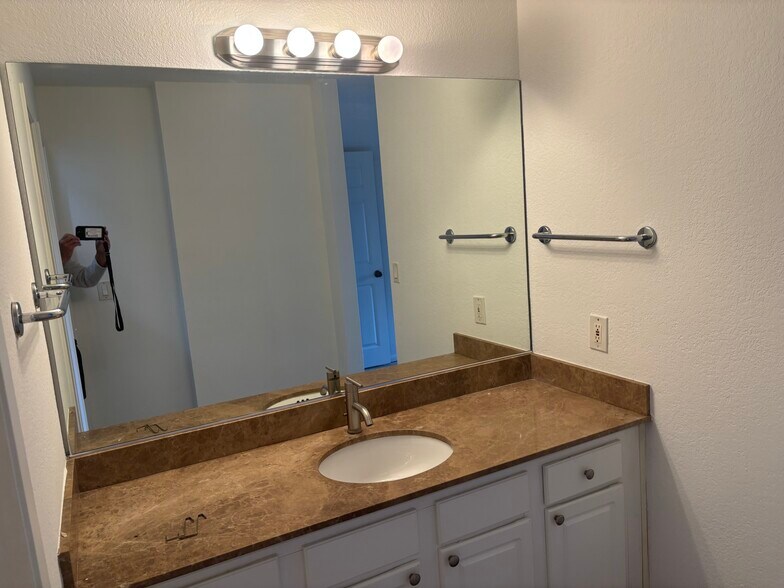 Vanity with granite countertops in each - 8889 Caminito Plaza Centro