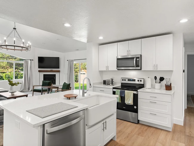 Building Photo - Fully Renovated 5-Bed Home with RV Parking & Garage | Sandy