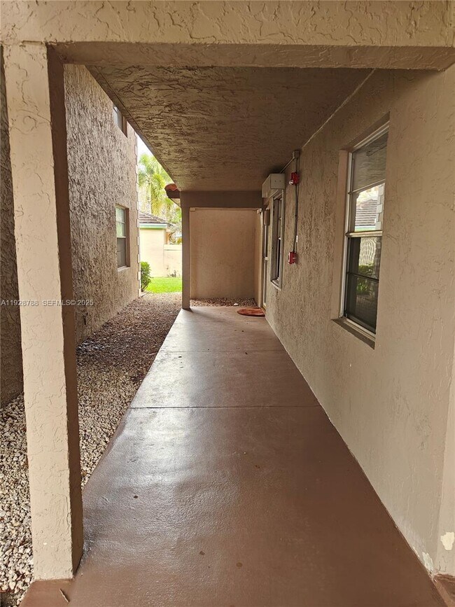 Building Photo - 8750 Royal Palm Blvd