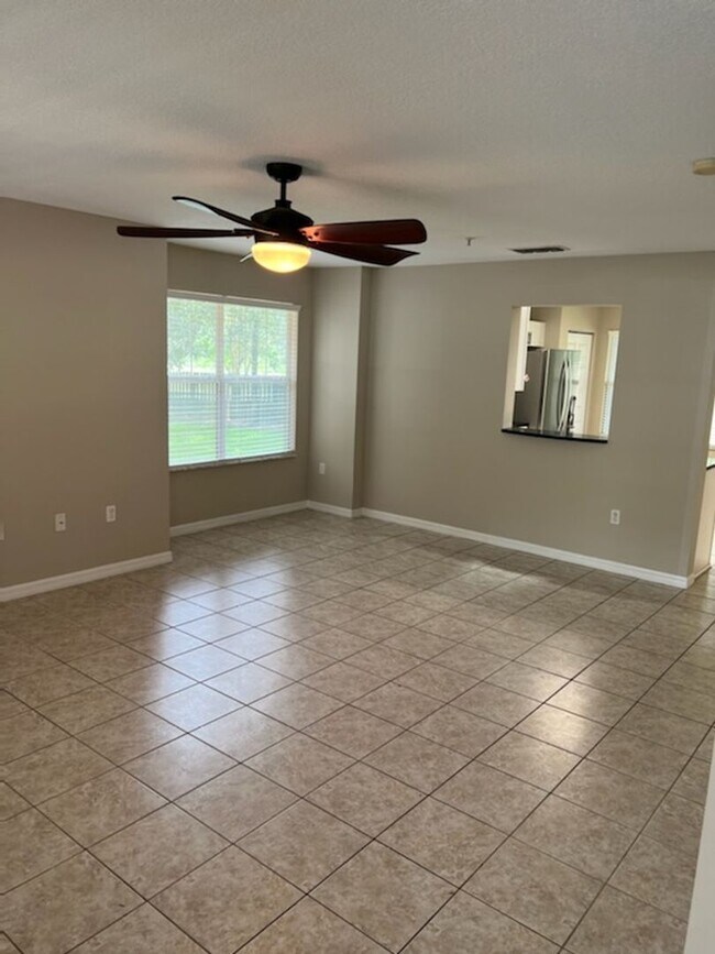 Building Photo - Three Bedroom Two 1/2 Bath condo in SW Hai...