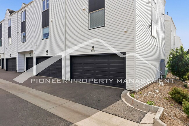 Building Photo - Spacious Townhouse with Central AC and 2-Car Garage