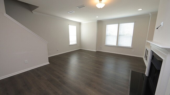 Building Photo - Upgraded & Spacious End Unit Townhome in V...