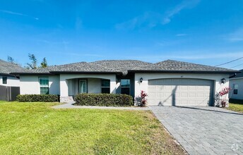 Building Photo - "Charming 4-Bedroom Cape Coral Gem!"