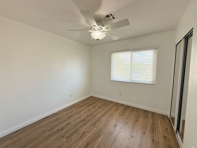 Building Photo - Corner Lot Beauty with Open Living, Guest Suite Down & Expansive Backyard