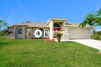 Building Photo - 3 Bedroom Pet-Friendly Home in Cape Coral, FL with Main Street Renewal