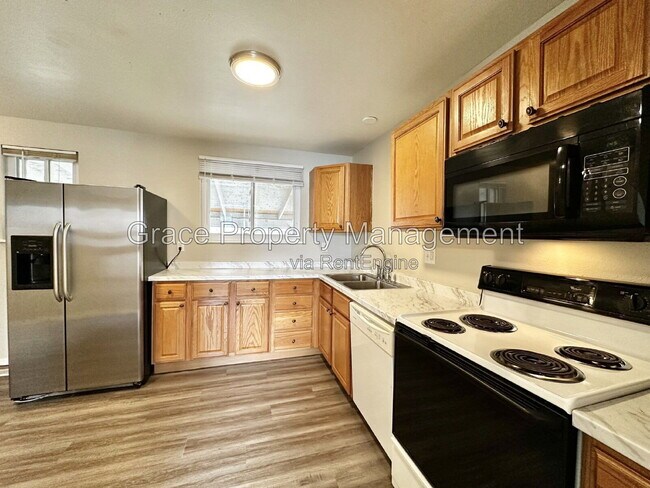 Building Photo - 3801 E 117th Ave