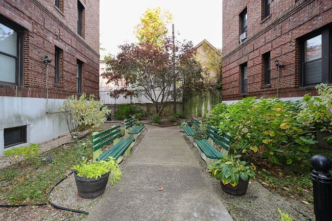 Building Photo - 11525 Metropolitan Avenue, 233
