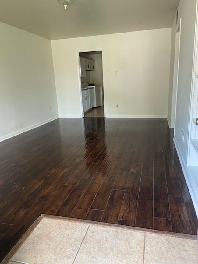 Building Photo - Nature in the Heart of the City: Live Near Moncus Park-2 BED 1 BATH
